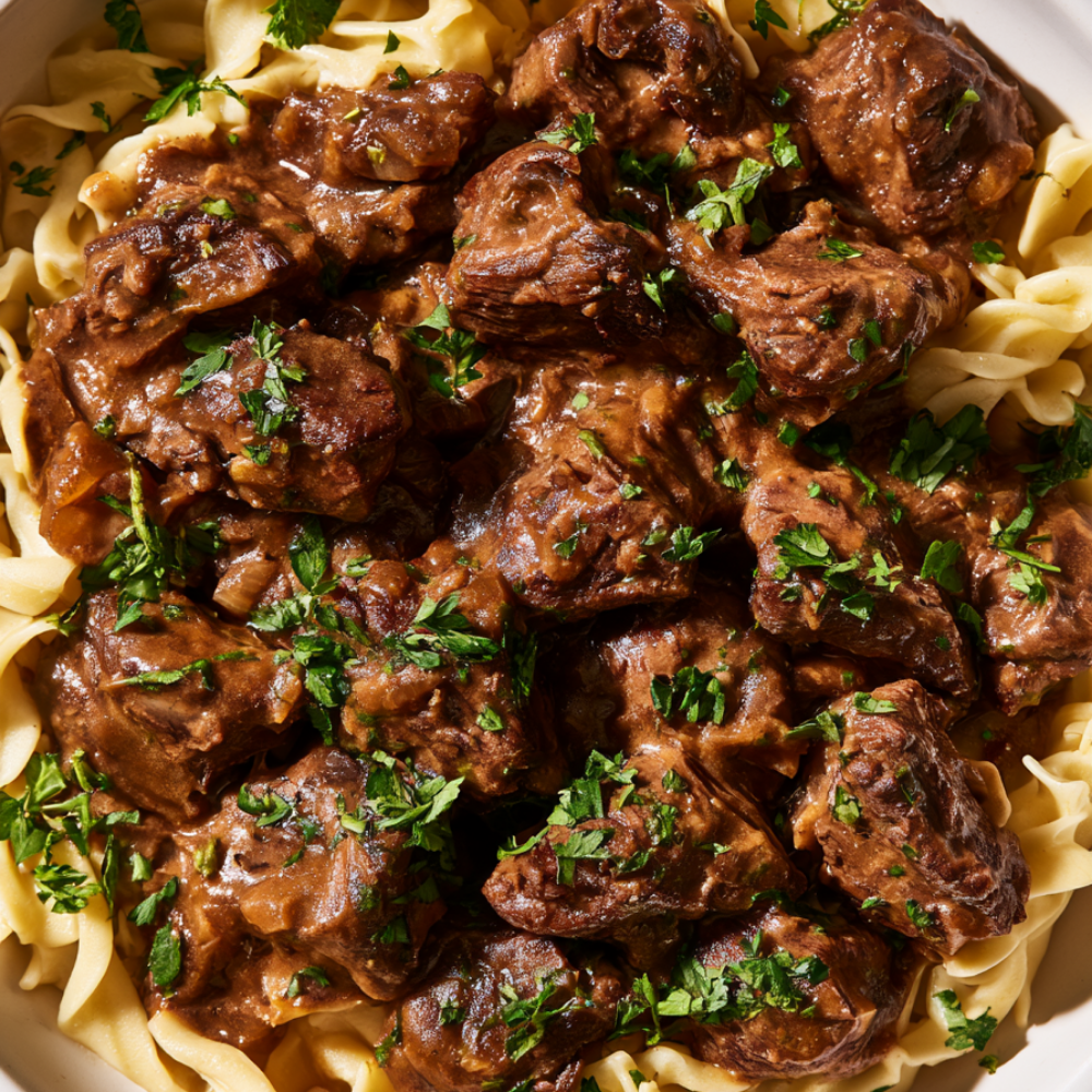 Crockpot Beef Tips and Gravy over noodles